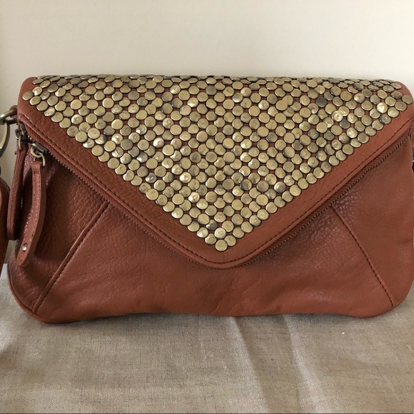 Urban Outfitters Handbags - Gold studded cross body bag